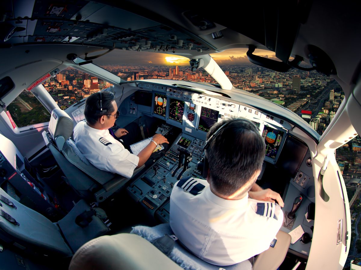 The,View,From,The,Passenger,Aircraft,Cockpit.,Pilots,At,Work.