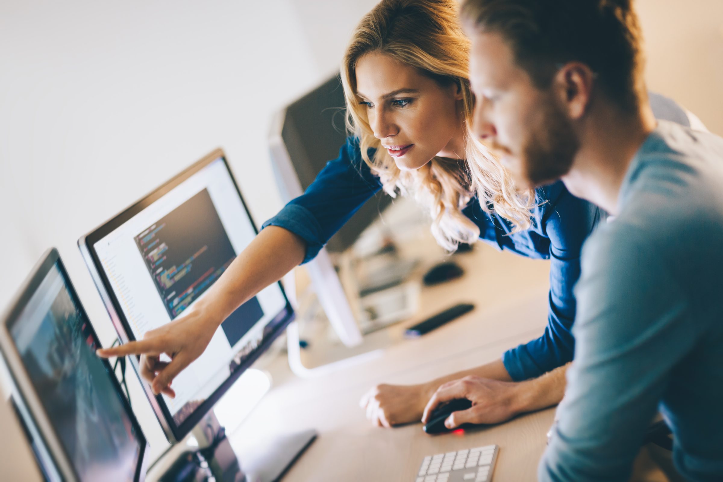Software developer working in a technology company office