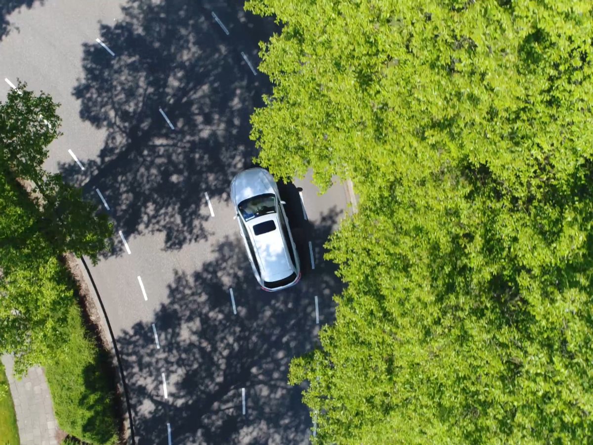 Aerial,Following,Car,Top down,View,This,Grey,Colored,Station,Wagon