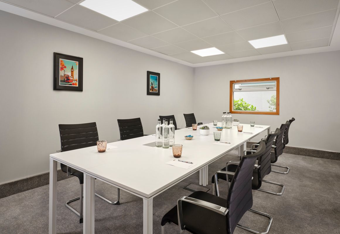 Plain meeting room set up before dressing for a corporate video interview