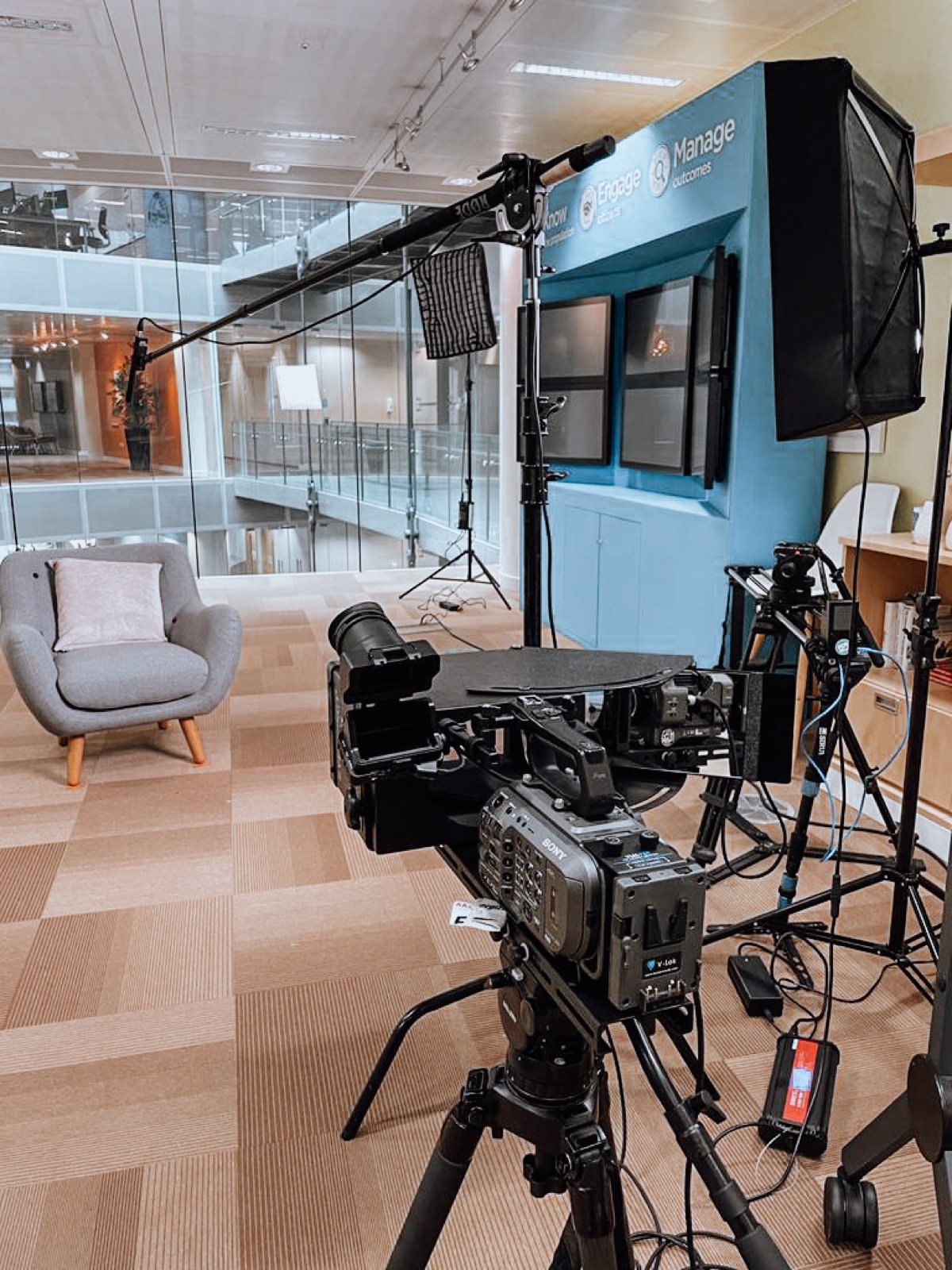 Multi-camera interview setup in an office atrium