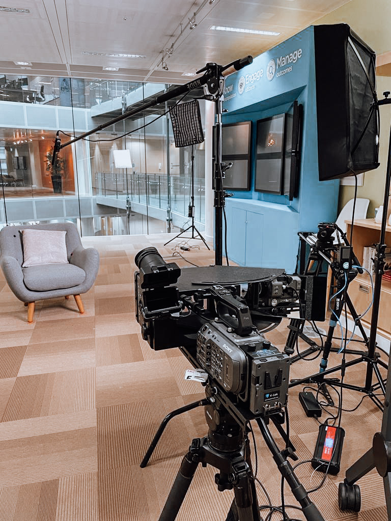 Multi-camera interview setup in an office atrium