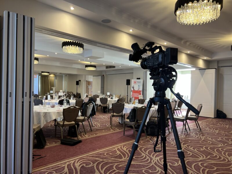Video camera tripod conference hall filming